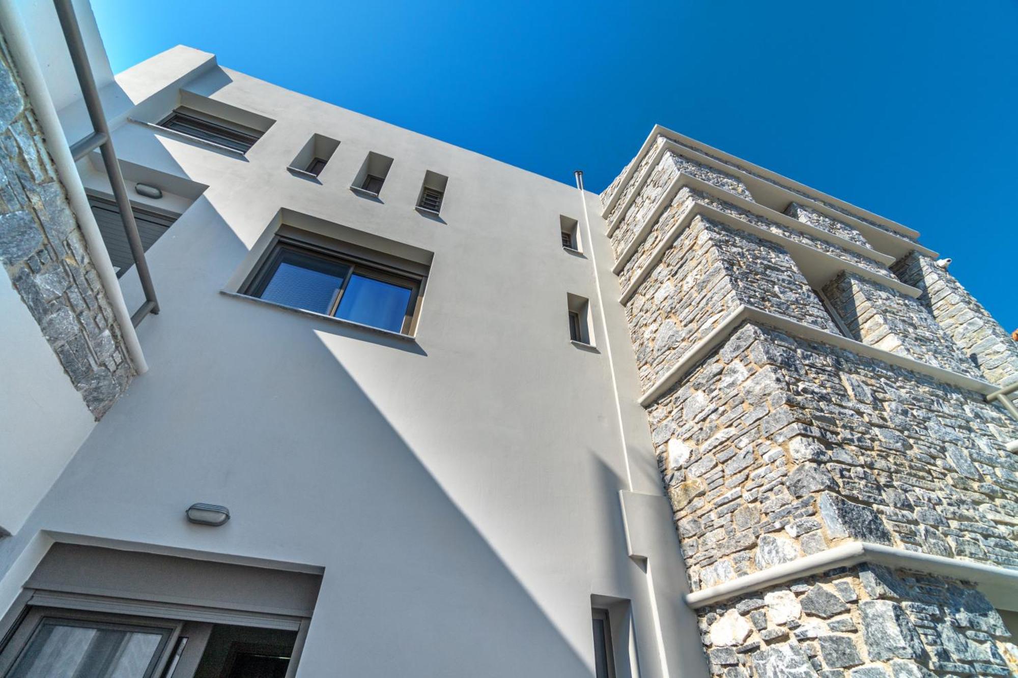 La Perla Suites Agioi Apostoloi  Dış mekan fotoğraf